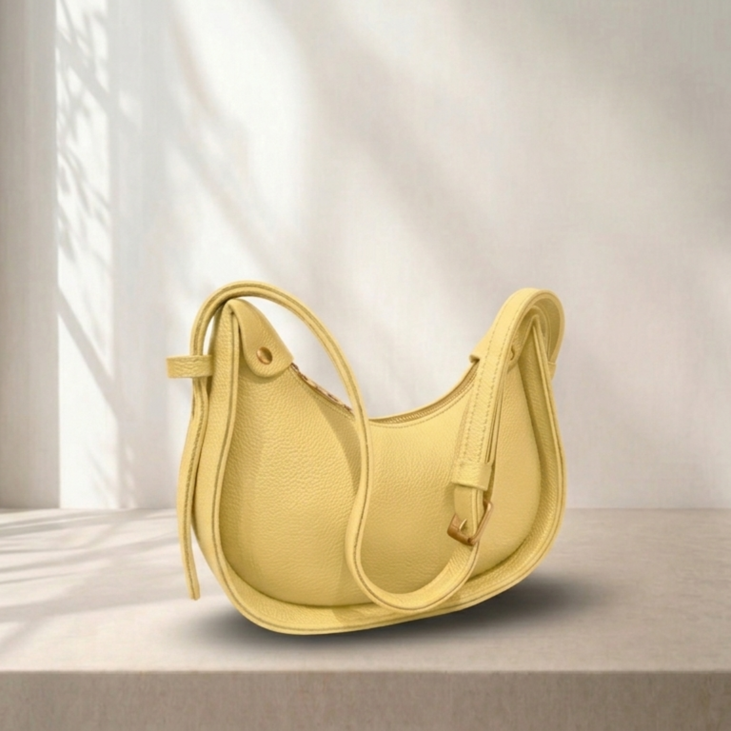 Yellow handbag on a light background
